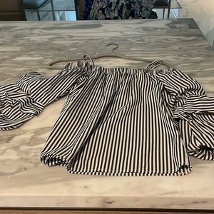 Beautiful top, very soft material. For every occasion